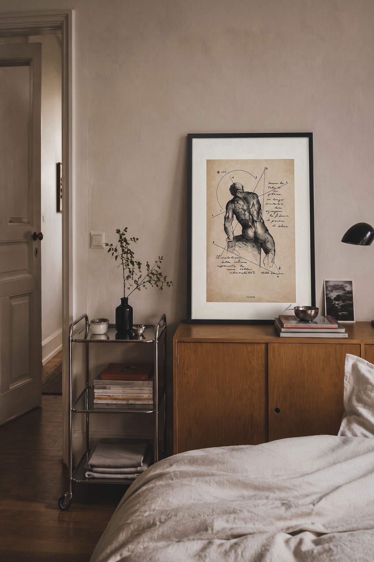 Framed print Dorsum displayed on a wooden cabinet in a bedroom - fine art wall art | Lorenzo Caia