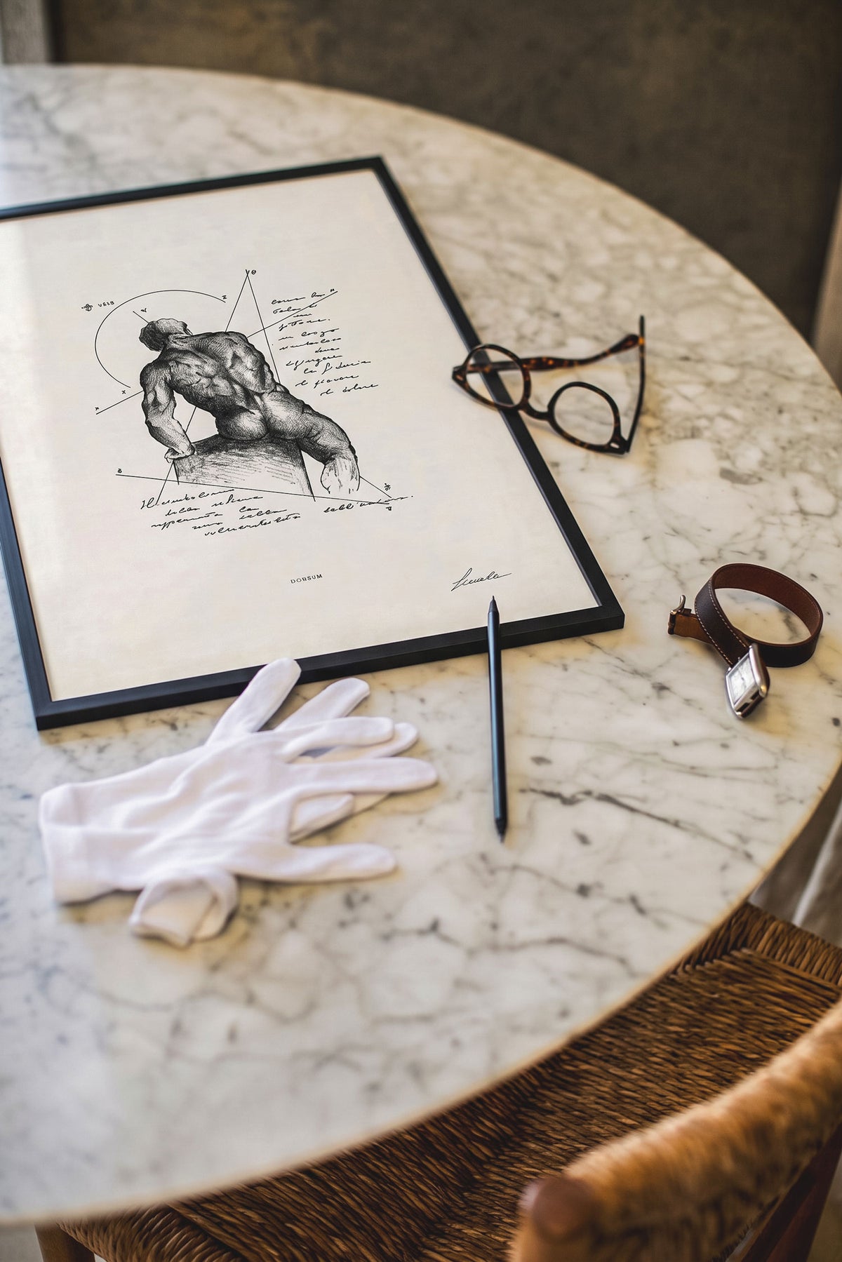 Framed print Dorsum on a marble table with studio accessories - fine art wall art | Lorenzo Caia
